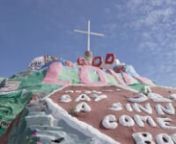 This is short visit to Leonard Knight’s Salvation Mountain near Slab City in the California Desert area of Imperial County. The structure is made of adobe, straw, and thousands of gallons of paint. It contains numerous murals and areas painted with Christian sayings and Bible verses.nnLeonard Knight: Salvation Mountain. Niland, California, February 20, 2020.nnSalvation Mountain is the work of Leonard Knight. Knight lived more than 20 years at Salvation Mountain, much of that time in a small ca