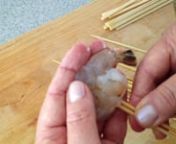 How to Thread Shrimp onto Skewers for Grilling from grilling