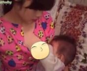 Beautiful asian young mom breastfeeding from beautiful mom breastfeeding