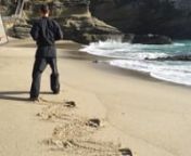 Sensei Jeff Kash shows how Half-Mooning is executed. Leaving a distinct trail in the sand of Table Rock Beach.