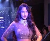 Throwback: Nora Fatehi is all about glam and glitters as she waltzed in a shimmery BRONZE lehenga. The dancing diva turned muse for ace designer Neeta Lulla at the Bombay Times Fashion Week 2019. She looked breathtakingly elegant in a sumptuous ensemble. Nora in her midriff-baring bronze lehenga opted for a studded choker as her accessories. Long wavy mane and a subtle makeup hit the bull’s eye to her look for the event.
