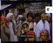 1950s Pakistan, Kashmir Village, Home Movies from 16mm from the Kinolibrary Archive Film Collections. To order the clip clean and high res for your commercial project or to find out more visit http://www.kinolibrary.com. Clip ref MI2.nSubscribe for more high quality, rare and inspiring clips from our extensive archive of footage.nnPAKISTAN/ KASHMIR pan down from mountain to very young children sitting on rooftop. Dilapidated building. Countryside, landscape, wild. Stone houses with thatched roof