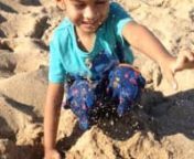 duggu playing with sand at marina beach chennai
