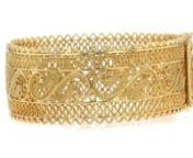 https://www.ross-simons.com/959723.htmlnnGo for the bold gold! This stunning bangle bracelet features beautiful filigree designs and a unique side clasp in polished 18kt yellow gold over sterling silver. Hinged with a figure 8 safety. 18kt gold over sterling filigree bangle bracelet.