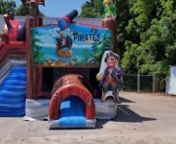 Arrr!!! Ahoy, Mates! Hop on into this Pirate Bounce House Slide Combo. This ship of a bounce house is equipped with everything a pirate needs such as, the captain and the captains best mate, Parrot. This bounce house also features the Jolly Roger flag flying at the top. Inside is a large bouncing area and basketball hoop. Make your event even more exciting by taking a slide down the 6ft Slide that can be used wet or dry.