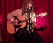 Jeffree St. John, producer and host of the Plymouth Coffee Bean Company&#39;s Open Mic Night in Plymouth, Michigan, performing an original song called