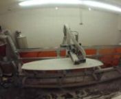 Dialing in our cnc surfboard shaping machine.