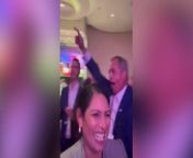 Home Secretary Priti Patel has been filmed dancing with former UKIP leader Nigel Farage at the Conservative Party conference in Manchester.&#60;br/&#62;&#60;br/&#62;The footage captures Ms Patel and Mr Farage throwing their hands up in the air and dancing to Frank Sinatra’s “Can’t Take My Eyes Off You”.&#60;br/&#62;&#60;br/&#62;Ms Patel was earlier full of praise for Mr Farage and his GB News channel, calling it a “defender of free speech” as she thanked staff for “absolutely everything they do”.&#60;br/&#62;&#60;br/&#62;The Conservative Party Conference continues today with speeches from Steve Barclay and Michael Gove.