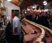 one hundred sake bombs dropped domino style at mobo sushi in santa cruz california on new years eve 2010