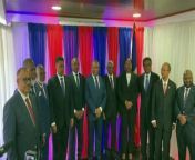As politicians gather at Haiti&#39;s National Palace for the swearing in of a new transitional council, sporadic gunfire can be heard nearby.Report by Dessent-Jacksonl. Like us on Facebook at http://www.facebook.com/itn and follow us on Twitter at http://twitter.com/itn
