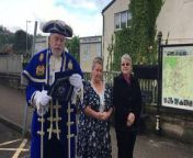 Lydney Town Crier Tim Embon reads the proclamation marking the first anniversary of the coronation of His Majesty the King.