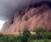 A massive sand storm slowly approaches 10 miles outside of Big Spring, Texas.
