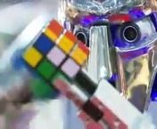A puzzle-solving robot is set to take visitors to the British Toy Fair back to the future.