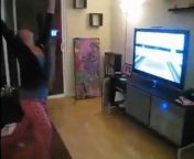 Girl Hit the ground when hse dance to celebrate her wii win